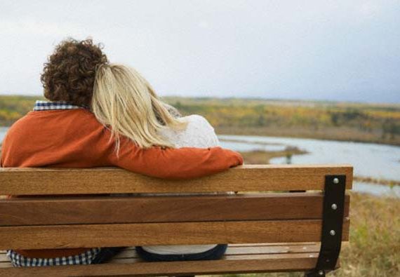 Couple sitting on bench