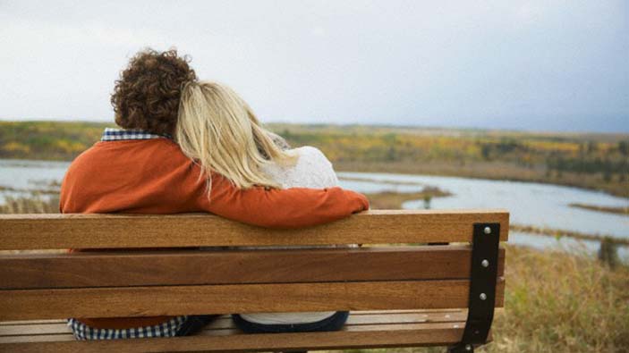 Couple sitting on bench