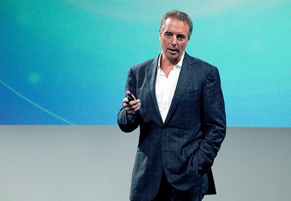 Dan Buettner speaking on stage.