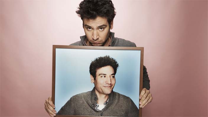 Josh Radnor holding picture of himself.