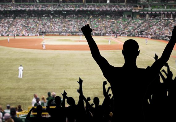 People Cheering at a Baseball Game.