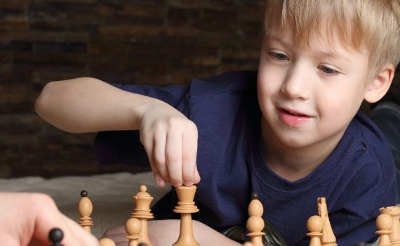 Boy playing chess