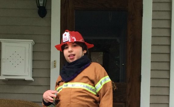 Max dressed as a fireman