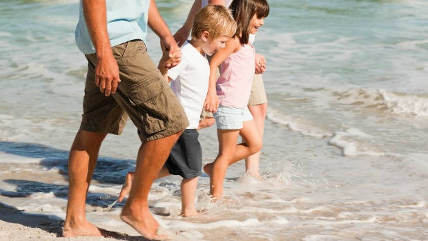 Family walking on the beach