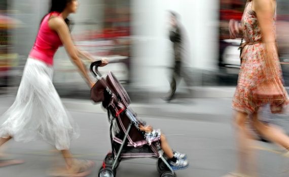 Parents with children in city environment