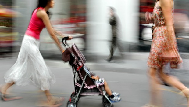 Parents with children in city environment