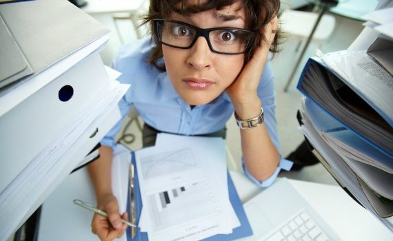 Busy worker at her desk