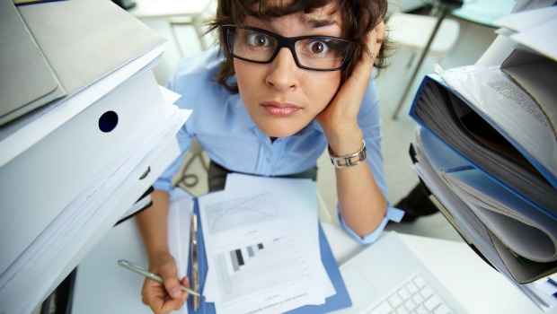 Busy worker at her desk