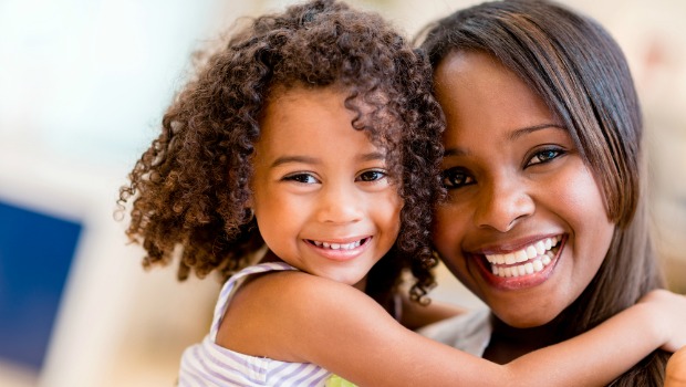 Happy woman and little girl