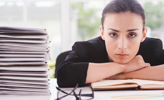 Stressed-looking woman at work