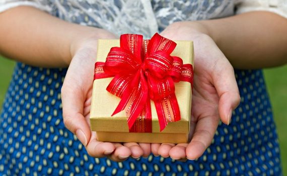 Person holding a present