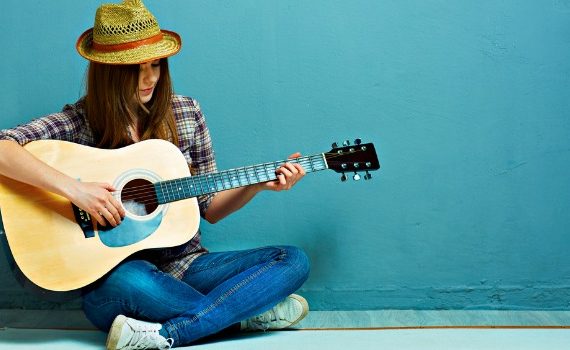 Woman playing guitar