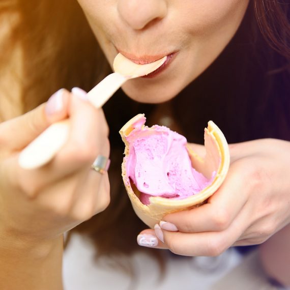 Woman savoring an ice cream cone