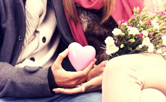 Two people sharing a valentine.