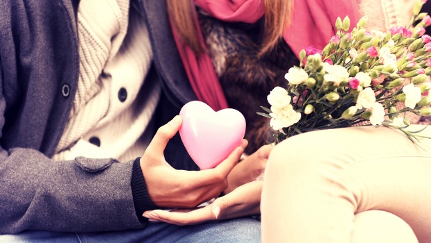 Two people sharing a valentine.