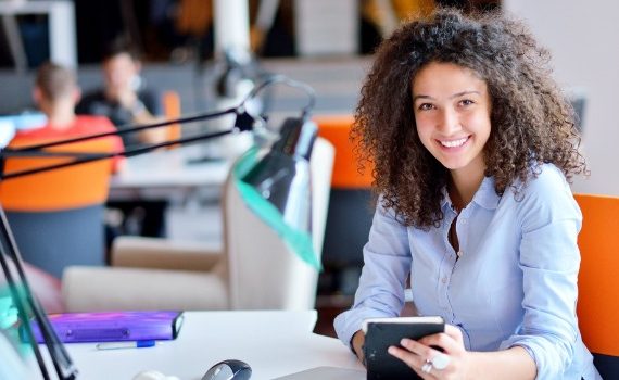 Happy woman at work.