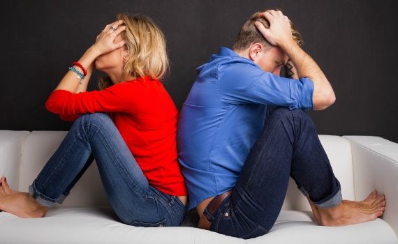 A frustrated couple having an argument.