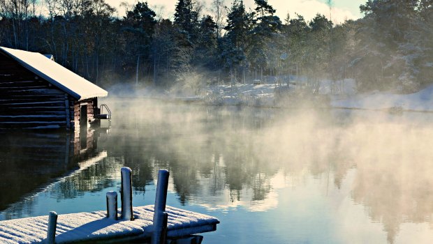 Log cabin on beautiful lake.