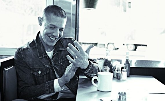 Actor Theo Rossi in a diner.