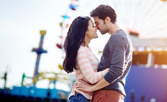 Romantic couple on a pier.