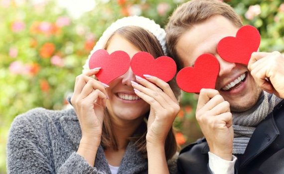 Cute couple with hearts over their eyes.