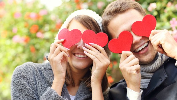 Cute couple with hearts over their eyes.