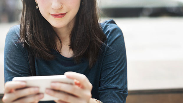 Woman looking at her phone.