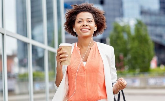 Confident woman walking to work.