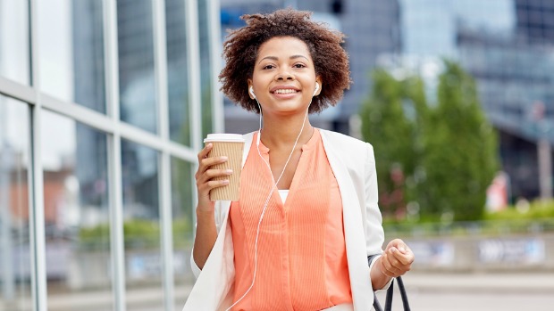 Confident woman walking to work.