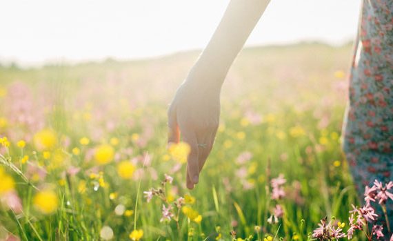 Woman in a field of wildflowers