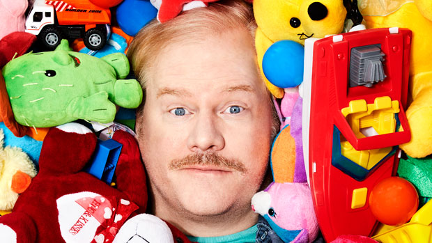 Jim Gaffigan buried in toys