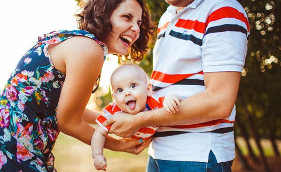 Happy parents with baby.