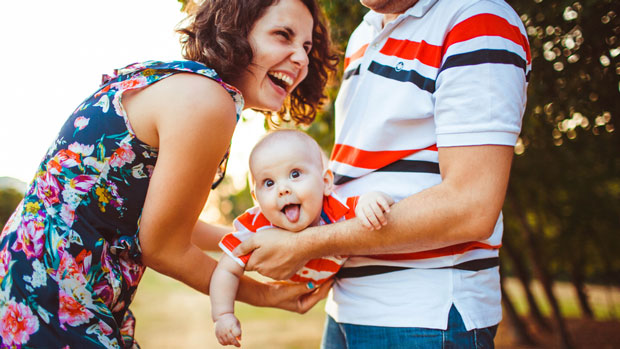 Happy parents with baby.