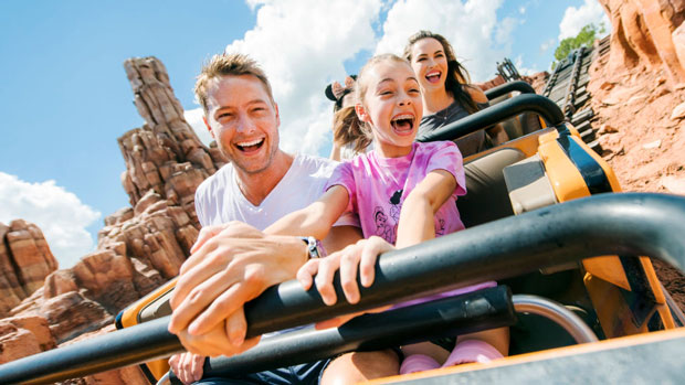 Family on a ride at Disney World