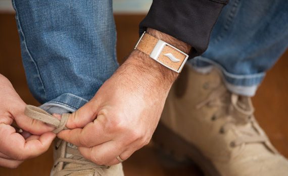 Man wearing a WellBe bracelet.