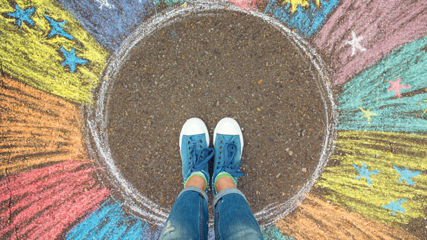 Person standing in chalk outline.