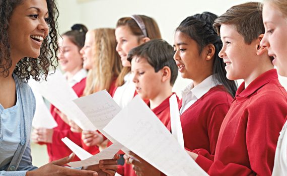 Woman teaching choir