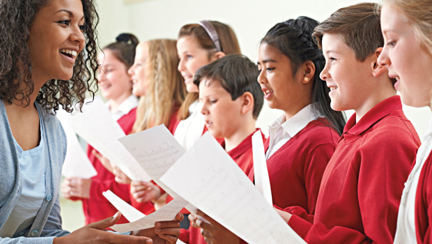 Woman teaching choir