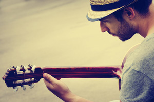 Guy playing guitar