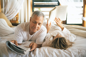 Couple reading in bed