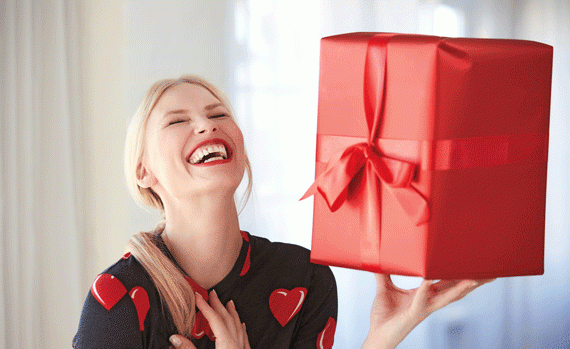 Happy woman with gift