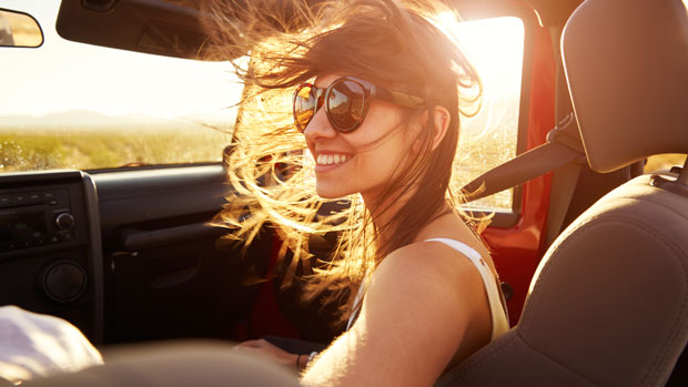 Woman in passenger seat of car