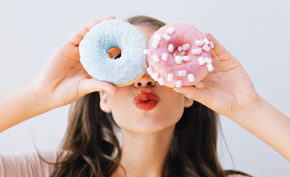 Woman with donuts