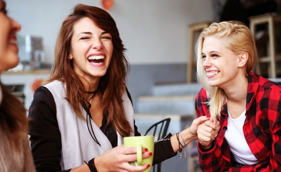 Happy women in a cafe