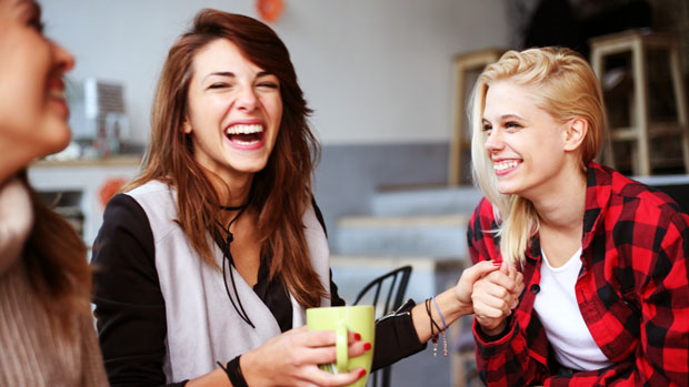 Happy women in a cafe