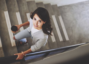 Woman walking up stairs