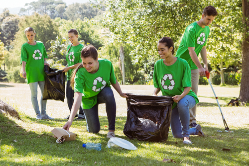 Picking up trash in a park