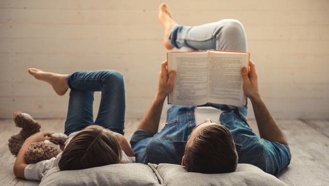 dad and son reading books