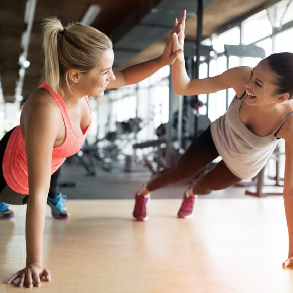 women working out in gym together