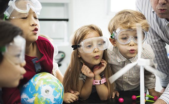 Kids in goggles for science experiment